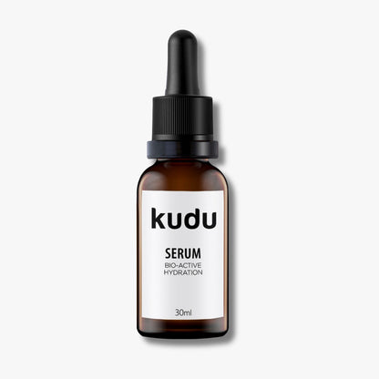 An amber dropper bottle with Kudu Cosmetica Serum Bio Active Hydration on a plain background.