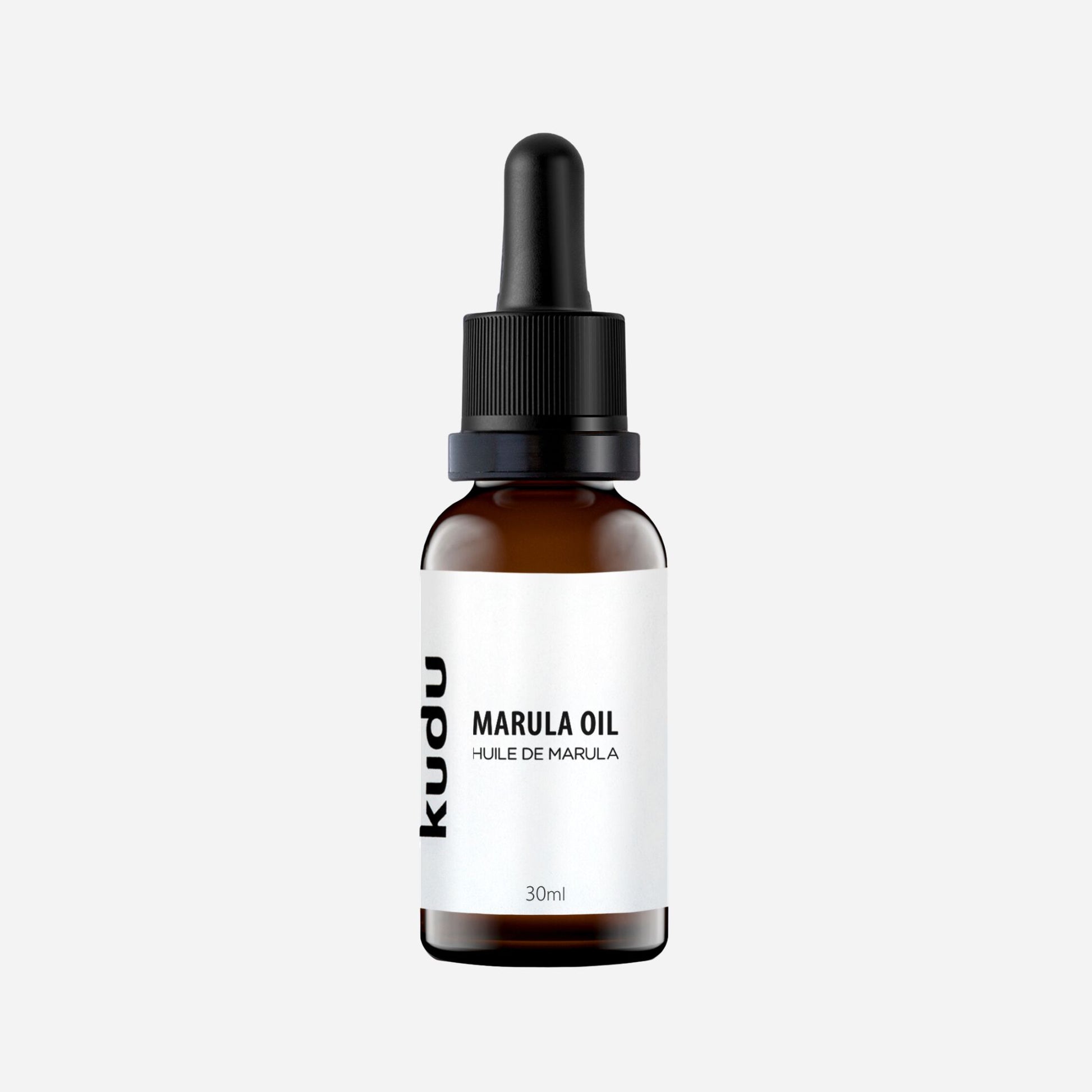 An amber glass bottle of Kudu Cosmetica Marula Oil for Face