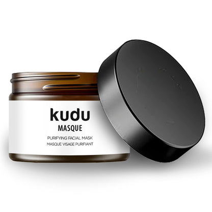 An image of Kudu Cosmetica Purifying Facial Mask in an amber glass jar with the cap off. 