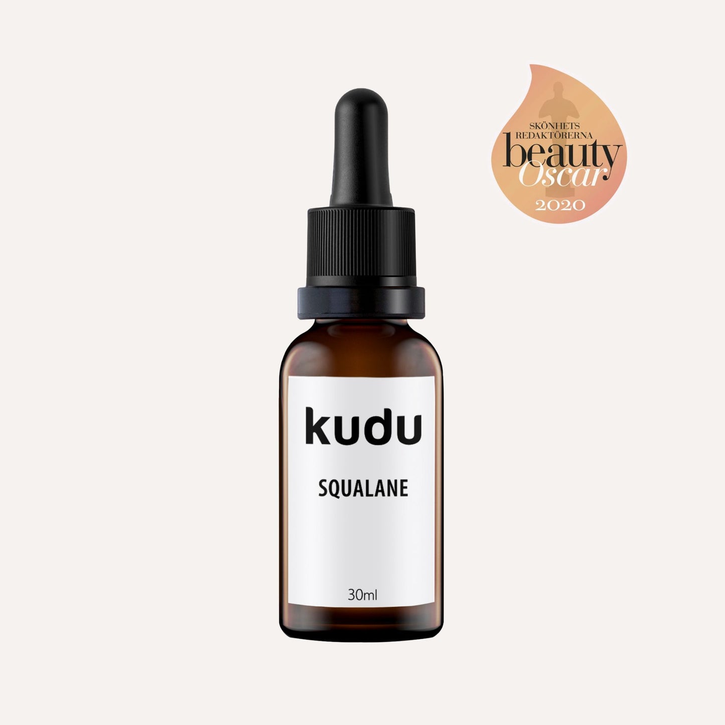 A bottle of Kudu Cosmetica  award winning Squalane oil on a plain background