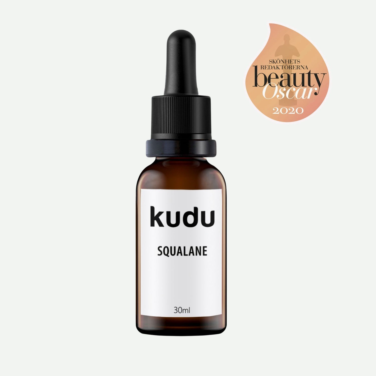 A bottle of Kudu Cosmetica  award winning Squalane oil on a plain background