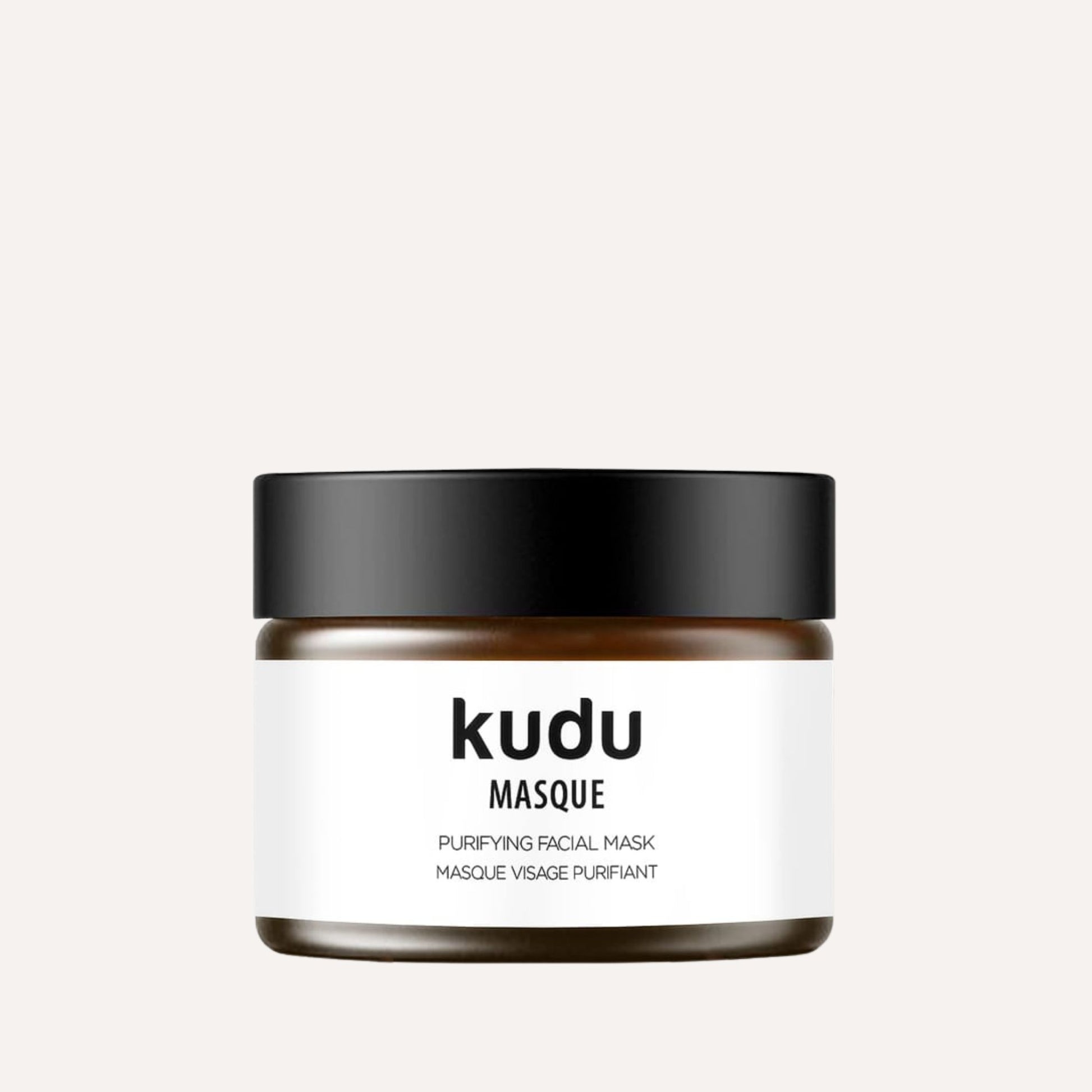  Kudu Cosmetica Purifying Face Mask in an amber glass jar on a plain background.